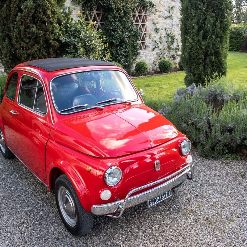 red Fiat at luxury Tuscan villa